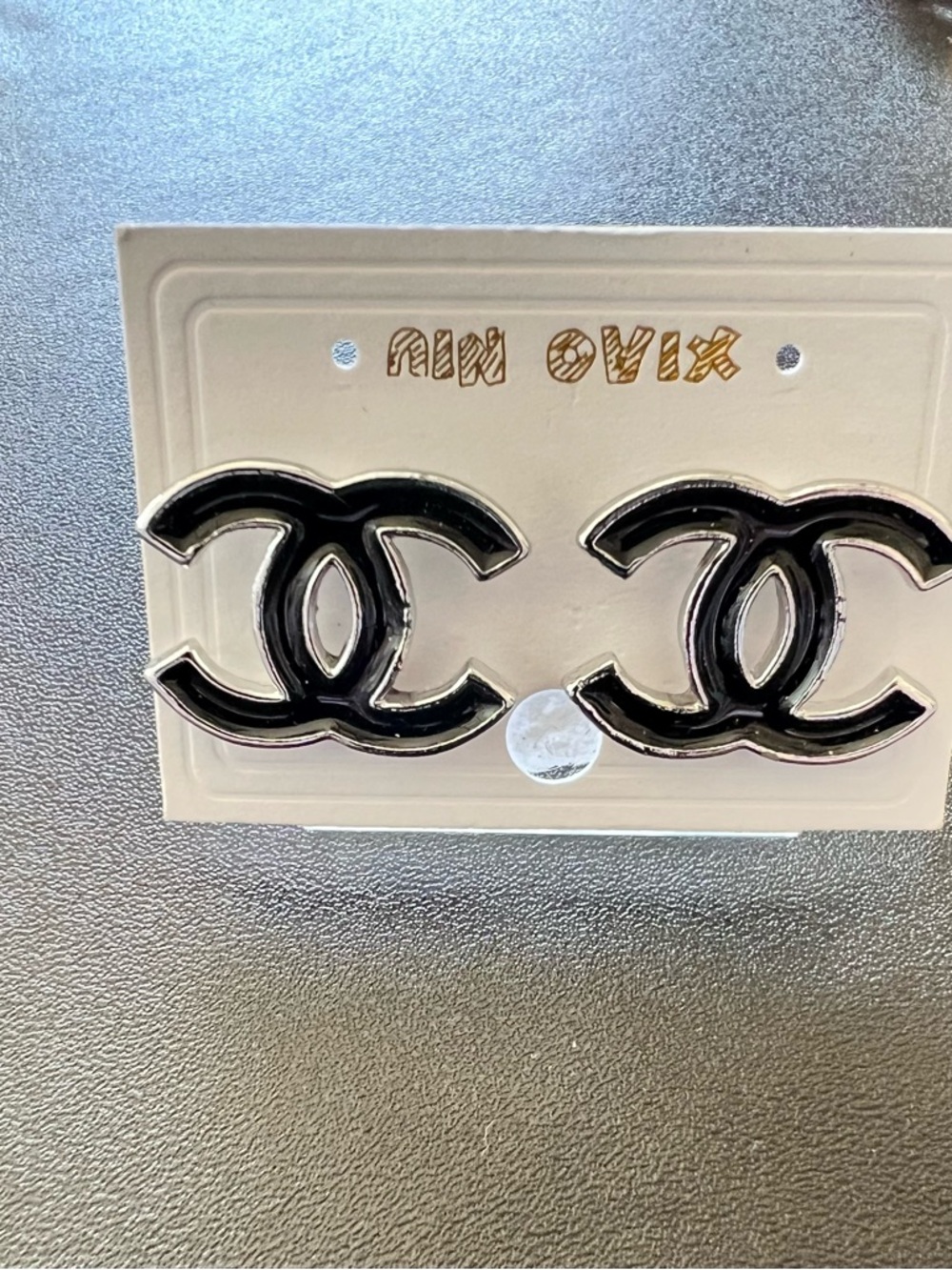 Black Interlocking Designer Logo Earrings.